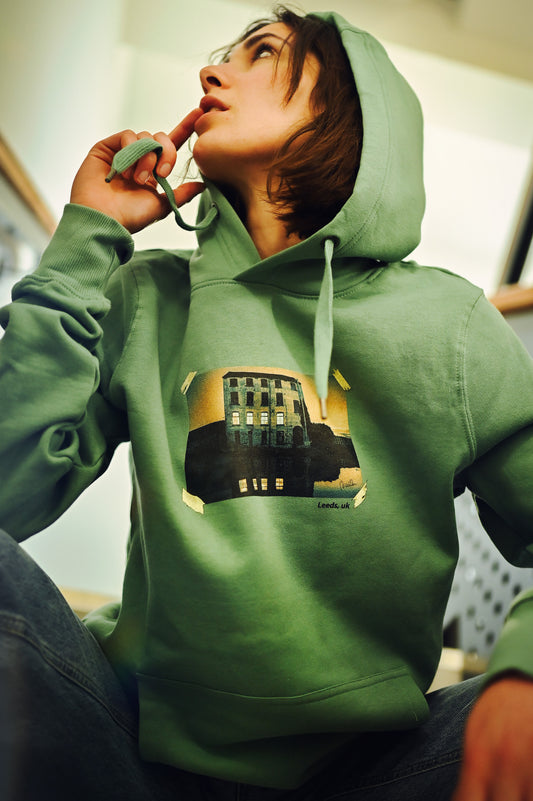Hoodie featuring an original photography design of a charming house during the last moments of sunset, this hoodie is made with 100% combed organic cotton
